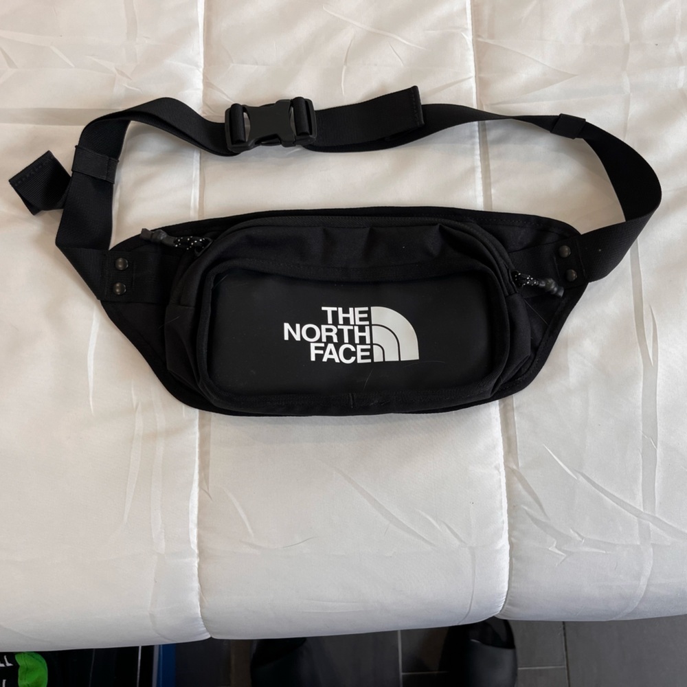 Two brand new sling bags.
